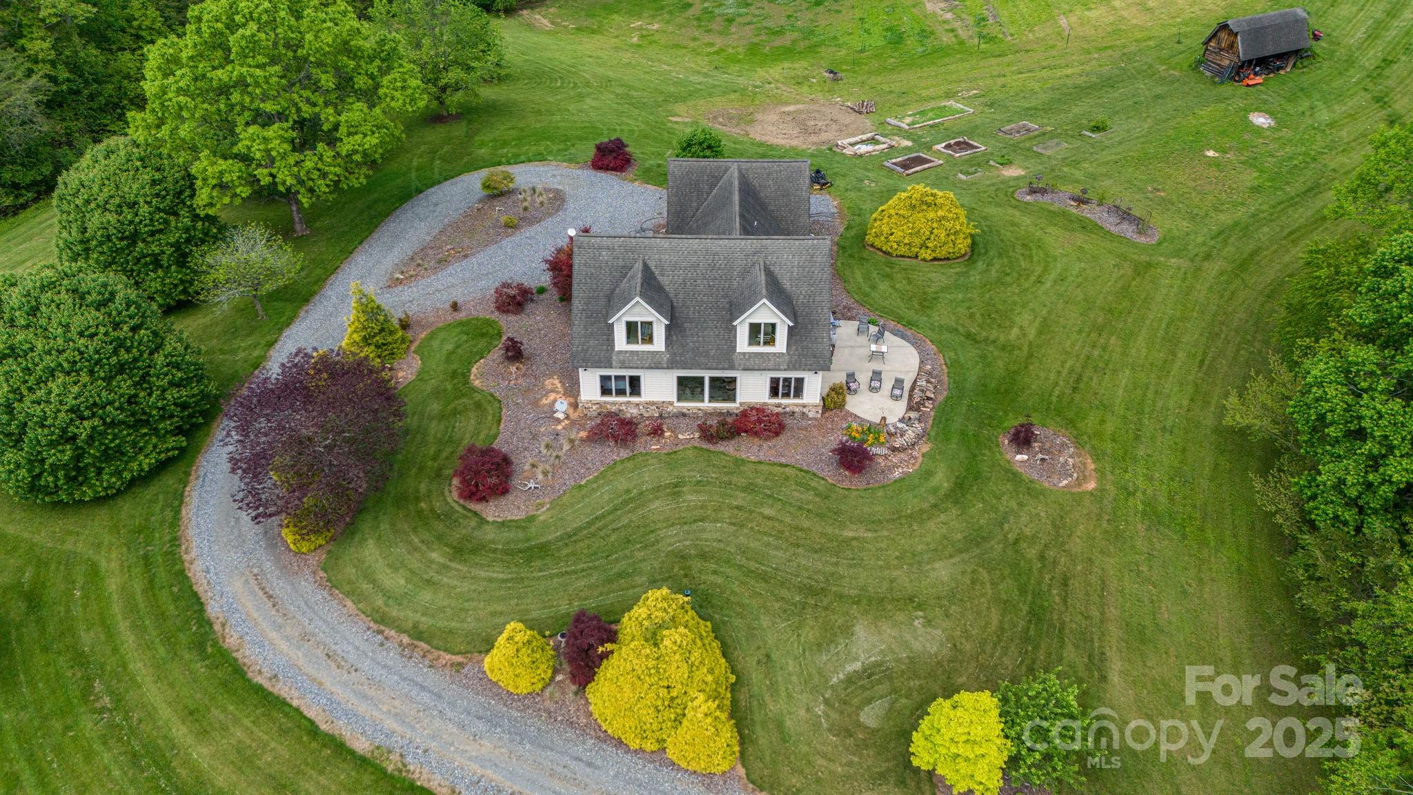 2912 Windswept Ridge Road Marshall, NC 28753 - Photo 33 of 47 an aerial view of a house