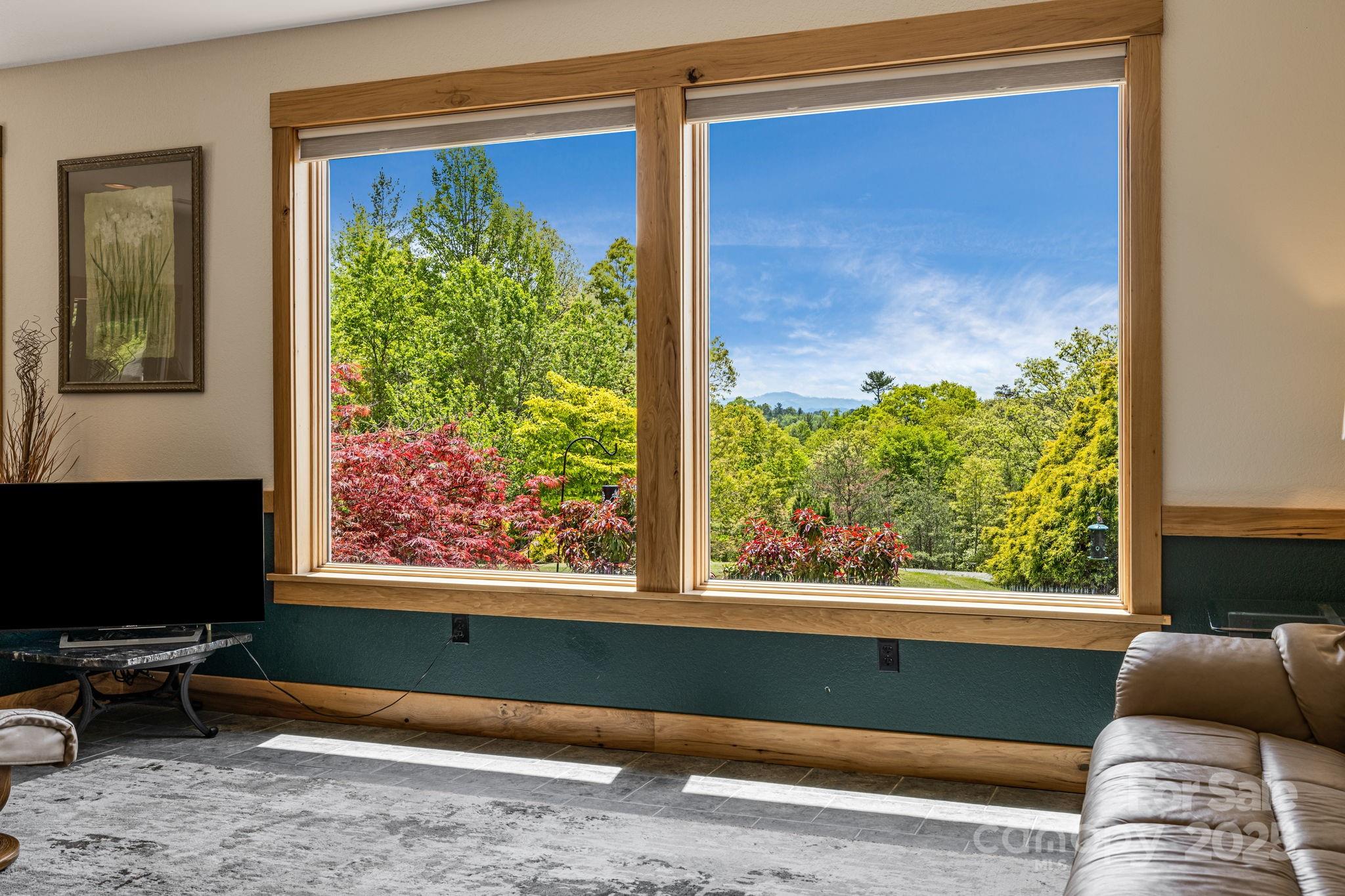2912 Windswept Ridge Road Marshall, NC 28753 - Photo 5 of 47 a living room with furniture and a window