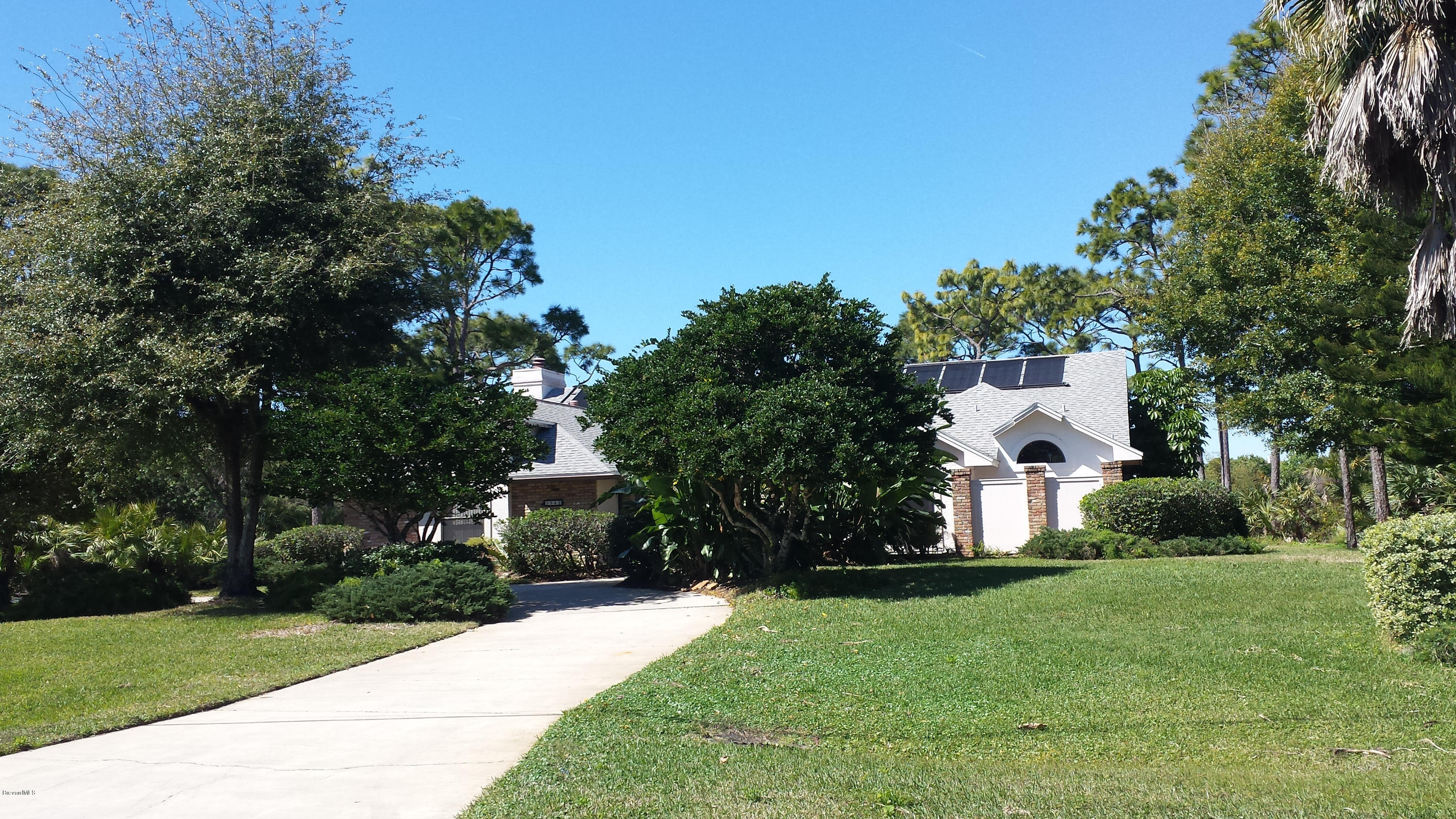 3942 Sparrow Hawk Road Melbourne, FL 32934 - Photo 3 of 12 Exterior From Road