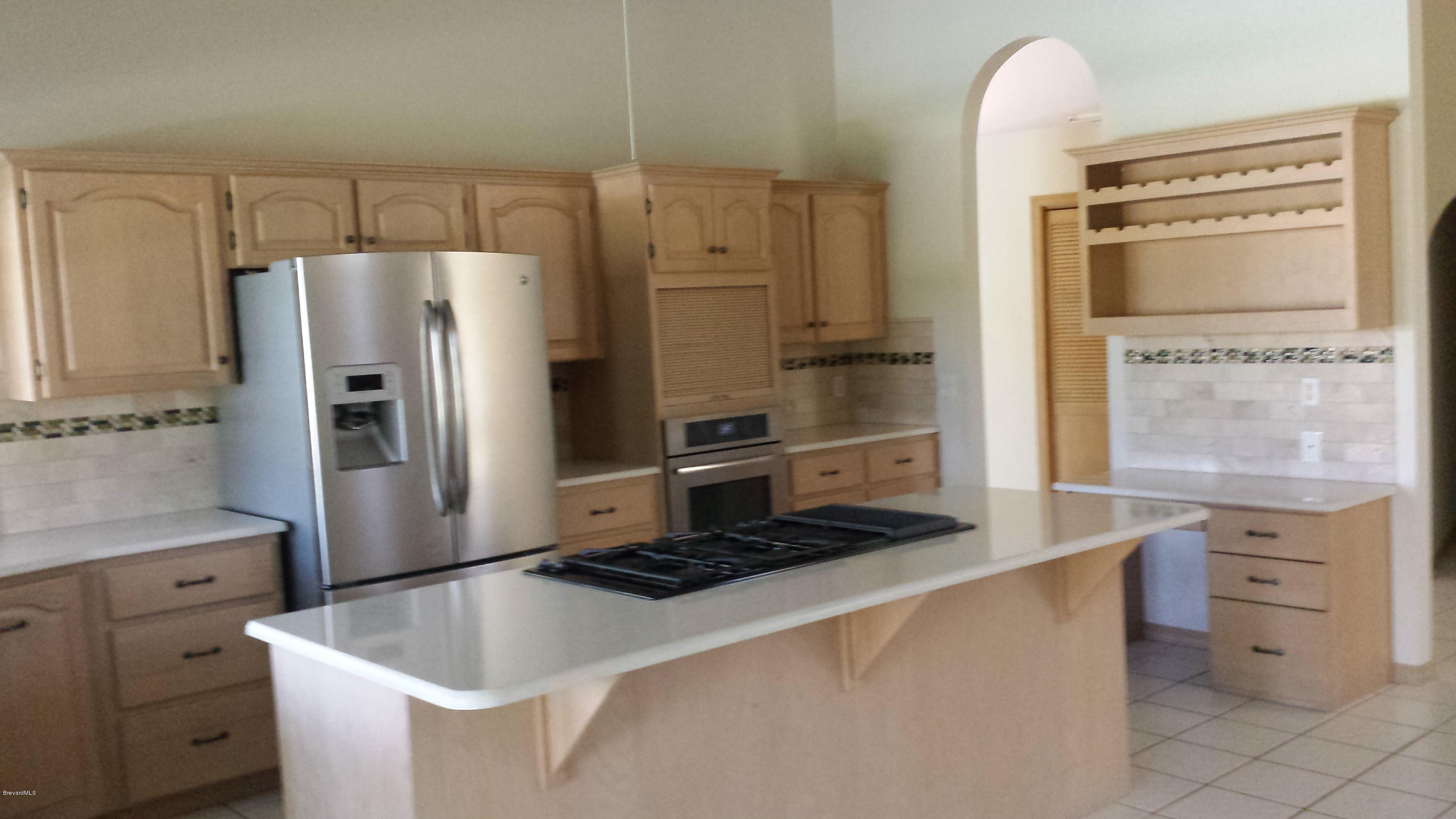 3942 Sparrow Hawk Road Melbourne, FL 32934 - Photo 7 of 12 kitchen 2