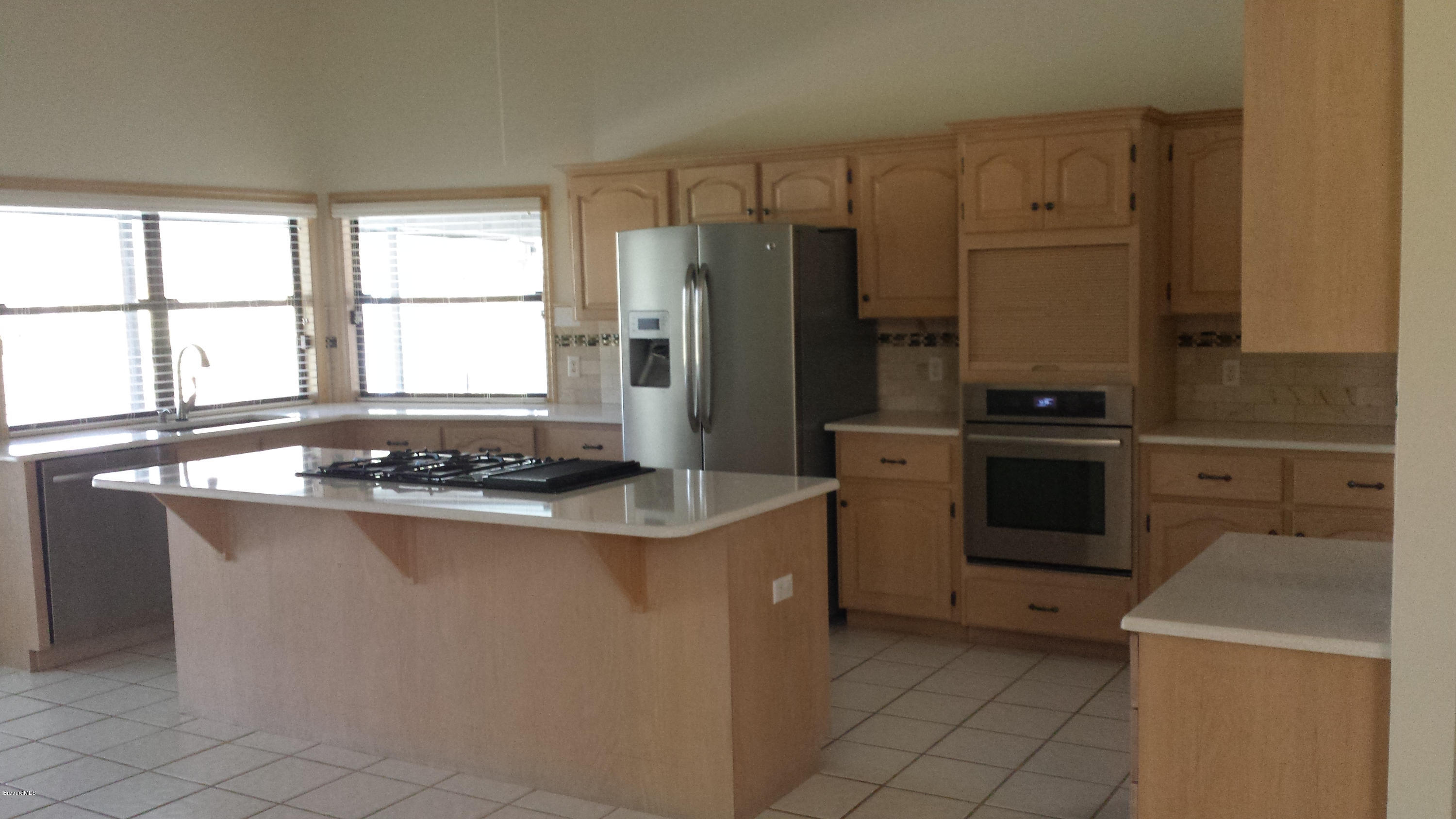 3942 Sparrow Hawk Road Melbourne, FL 32934 - Photo 9 of 12 Kitchen