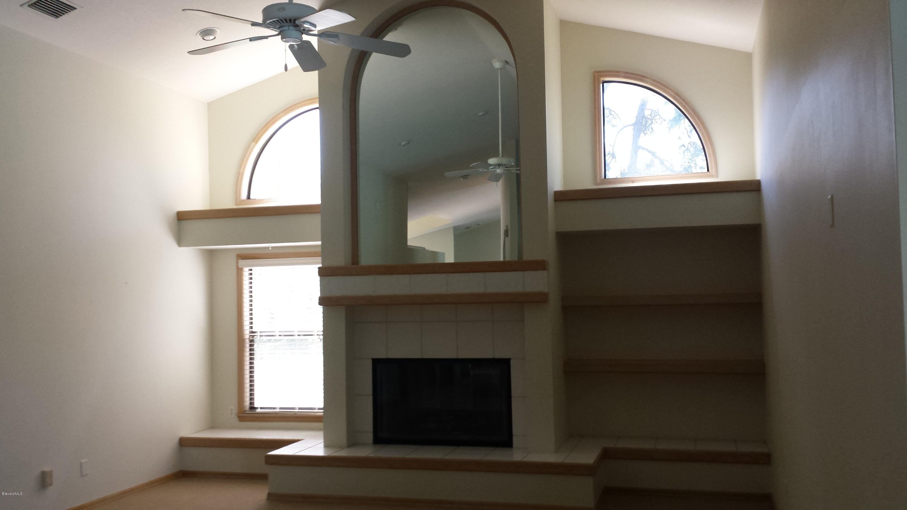 3942 Sparrow Hawk Road Melbourne, FL 32934 - Photo 10 of 12 Family Room Fireplace