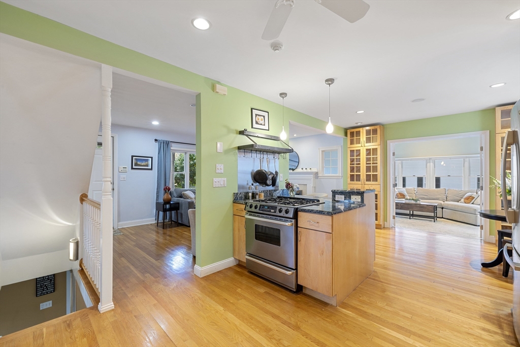 8 Hatch Road Medford, MA 02155 - Photo 15 of 42 a kitchen with stainless steel appliances granite countertop a stove and a refrigerator