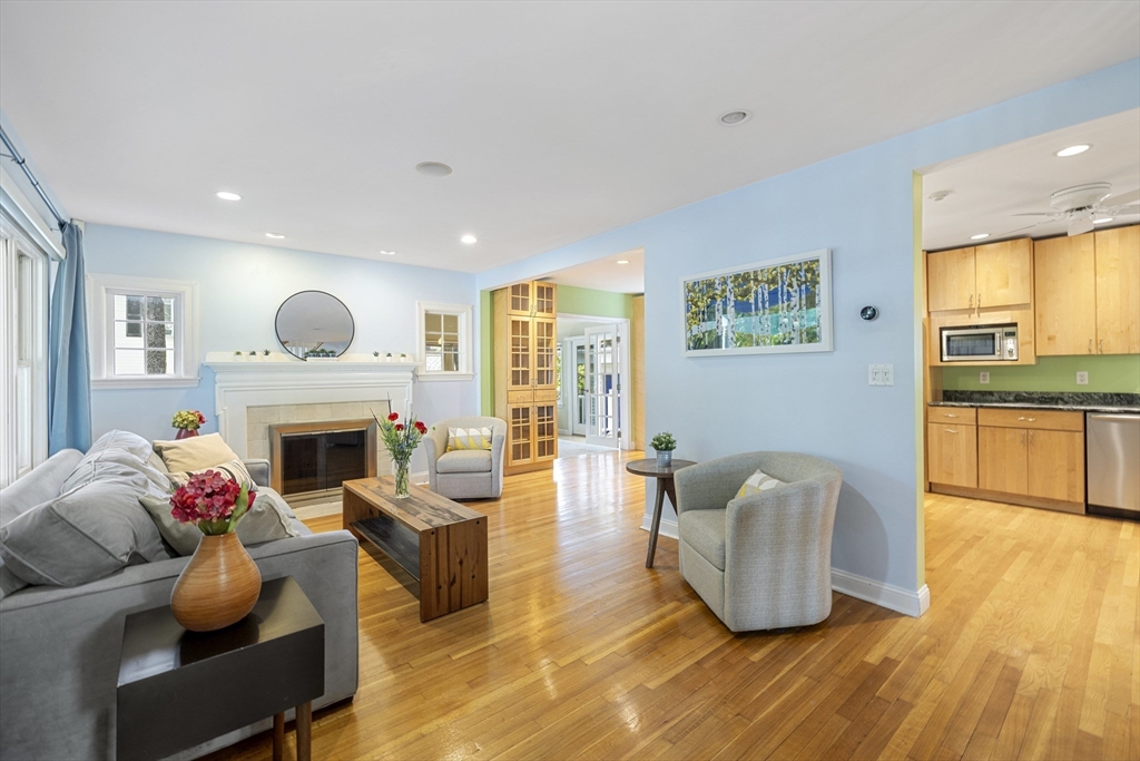 8 Hatch Road Medford, MA 02155 - Photo 2 of 42 a living room with furniture and a fireplace