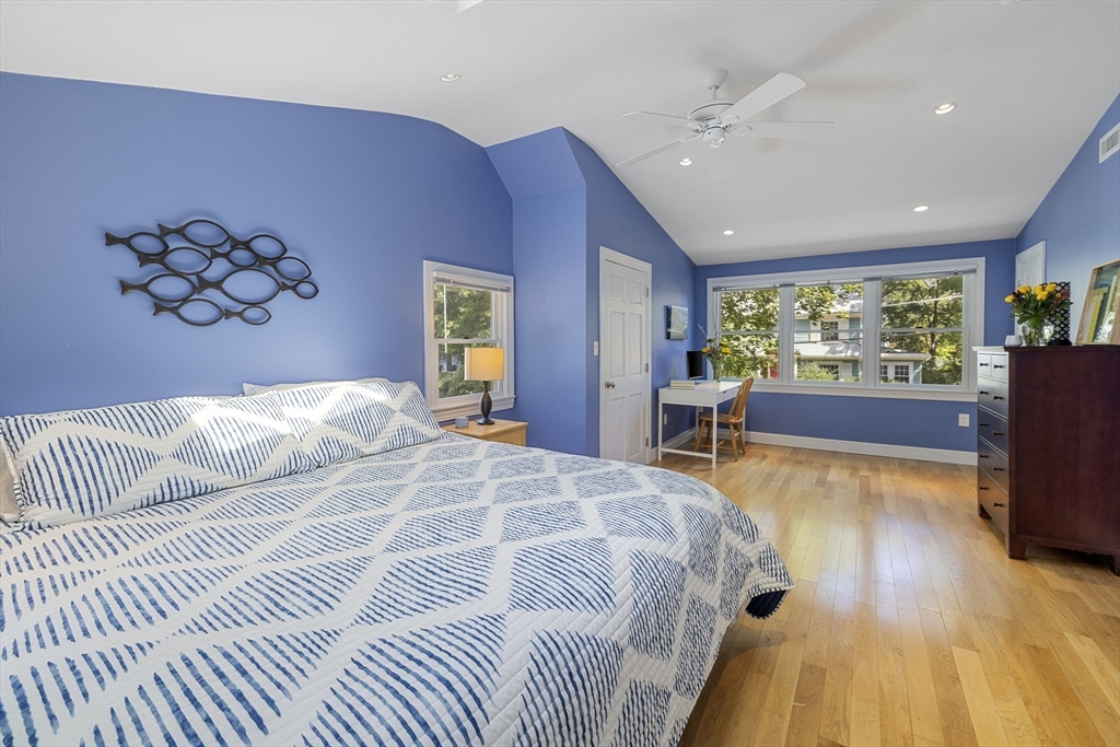 8 Hatch Road Medford, MA 02155 - Photo 22 of 42 a bedroom with a large bed and a large window