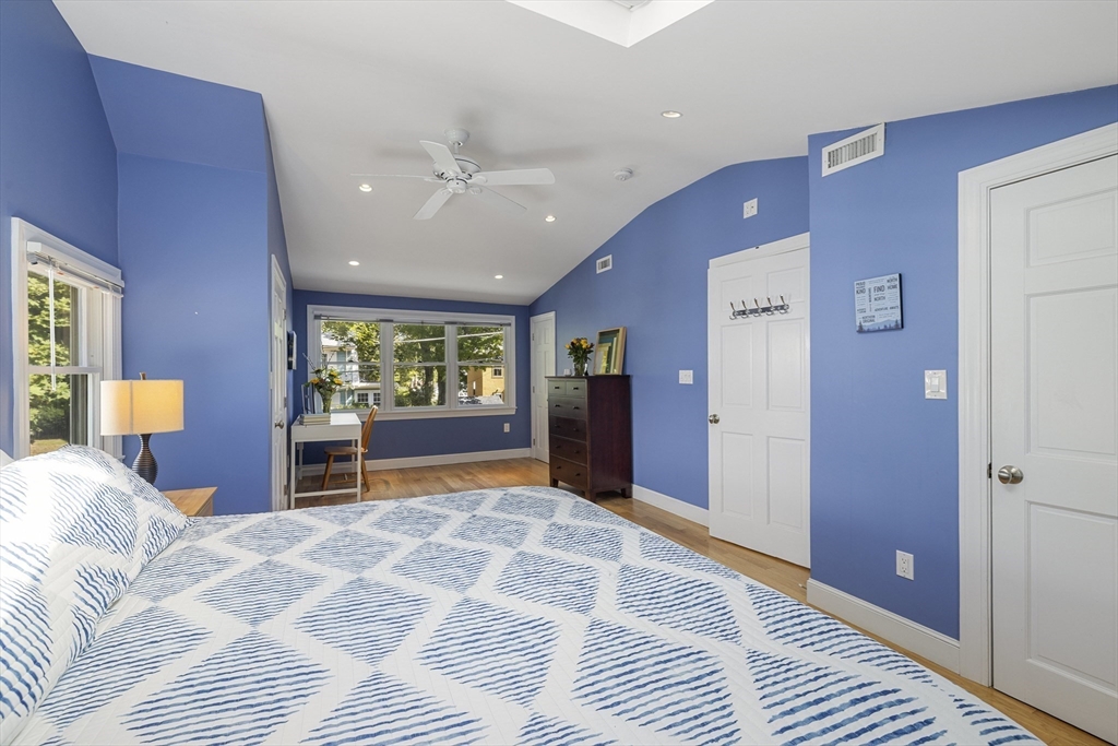 8 Hatch Road Medford, MA 02155 - Photo 23 of 42 a bedroom with a large bed and a window