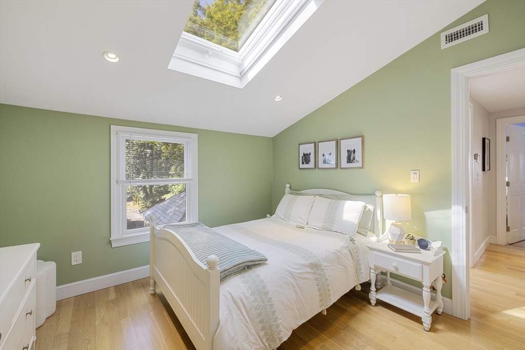 8 Hatch Road Medford, MA 02155 - Photo 25 of 42 a bedroom with a bed and a window