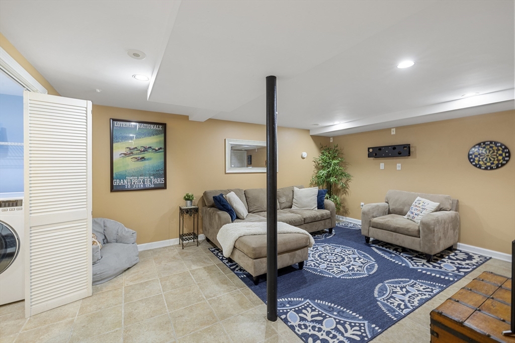 8 Hatch Road Medford, MA 02155 - Photo 30 of 42 a living room with furniture and wooden floor