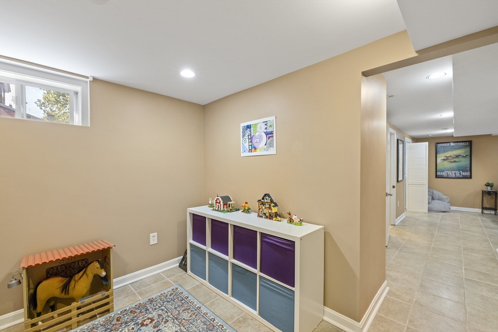 8 Hatch Road Medford, MA 02155 - Photo 35 of 42 a living room with furniture and a couch