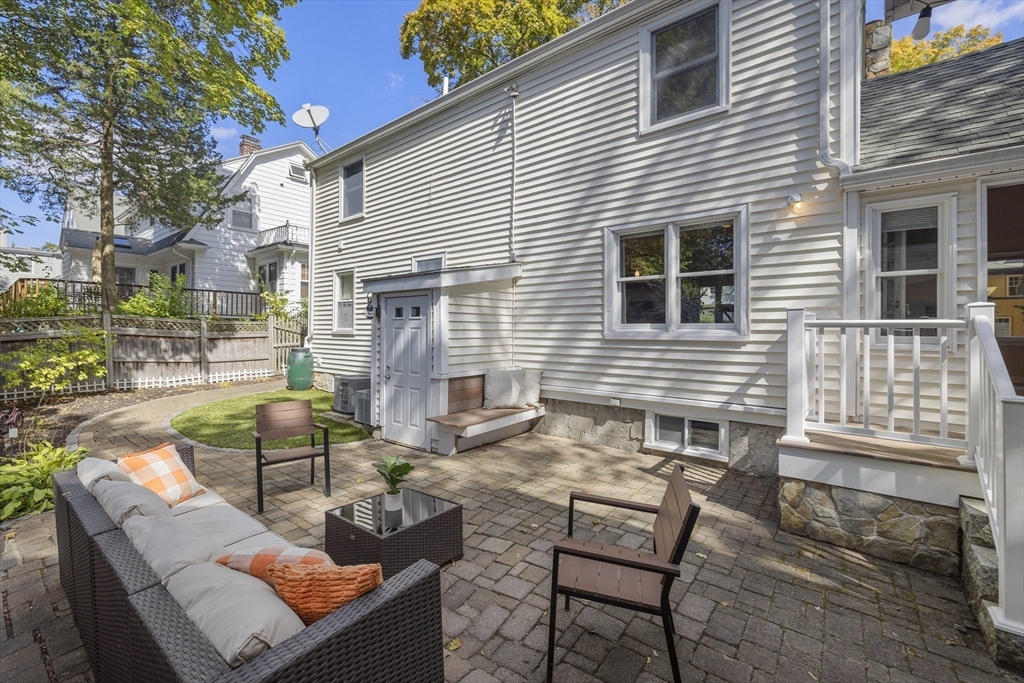8 Hatch Road Medford, MA 02155 - Photo 36 of 42 a view of a house with backyard and sitting area