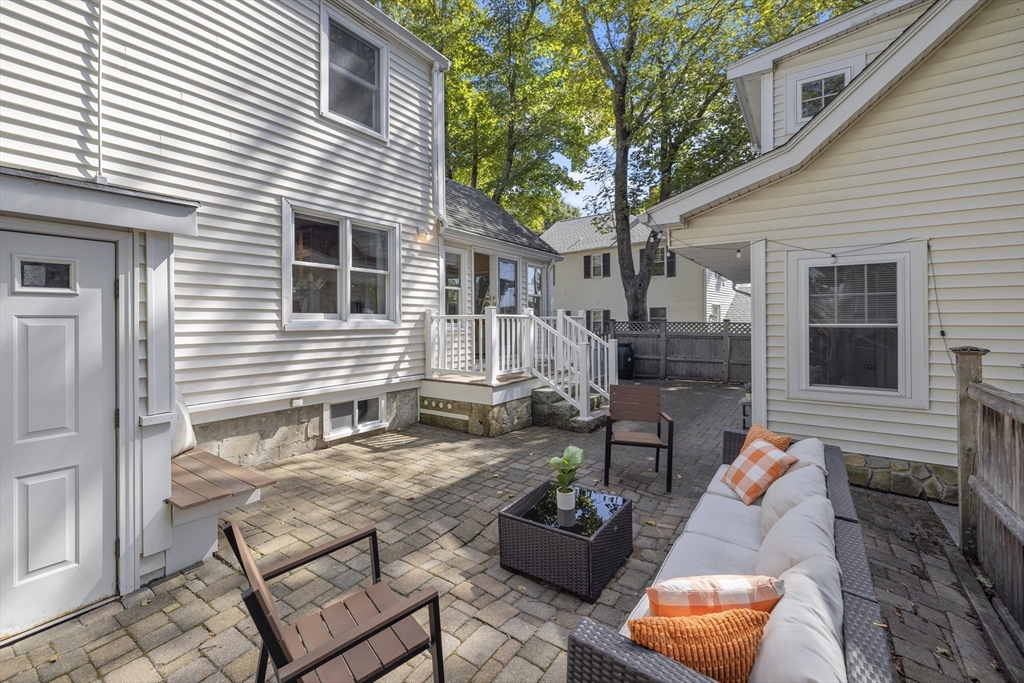 8 Hatch Road Medford, MA 02155 - Photo 40 of 42 a backyard of a house with seating space