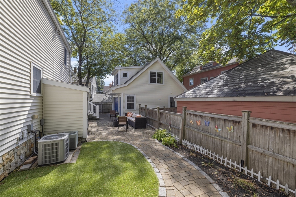 8 Hatch Road Medford, MA 02155 - Photo 42 of 42 a view of a chair and table in backyard