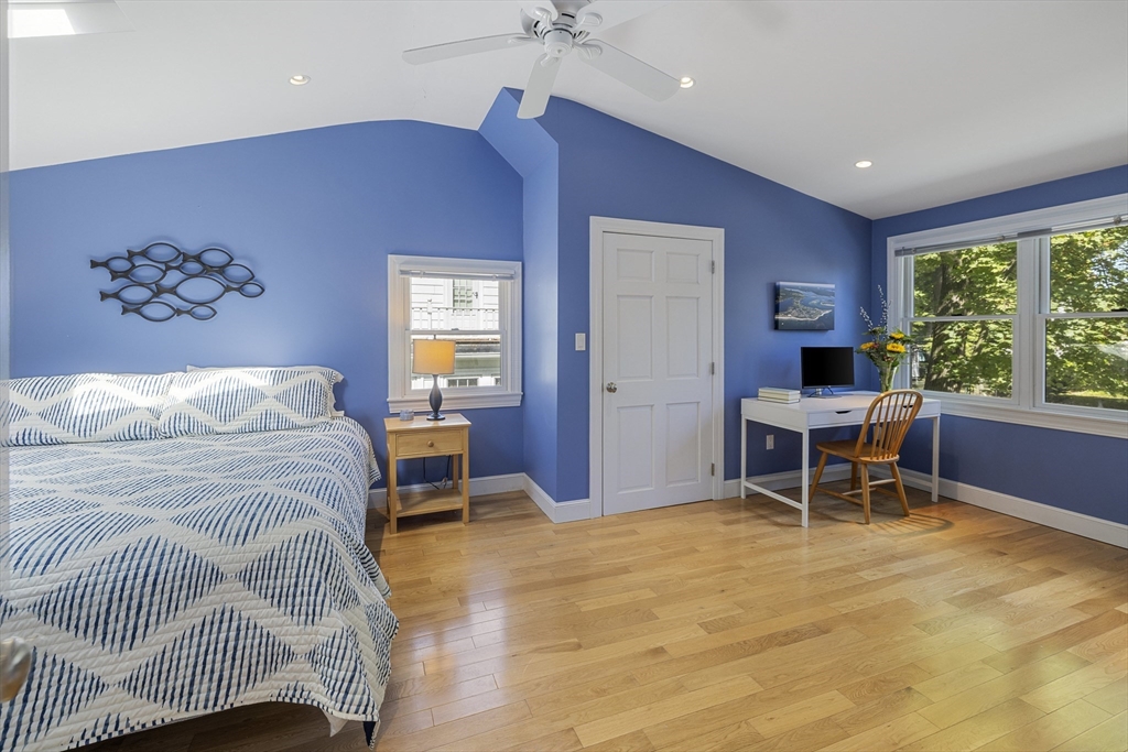 8 Hatch Road Medford, MA 02155 - Photo 5 of 42 a bed room with a bed and a chair