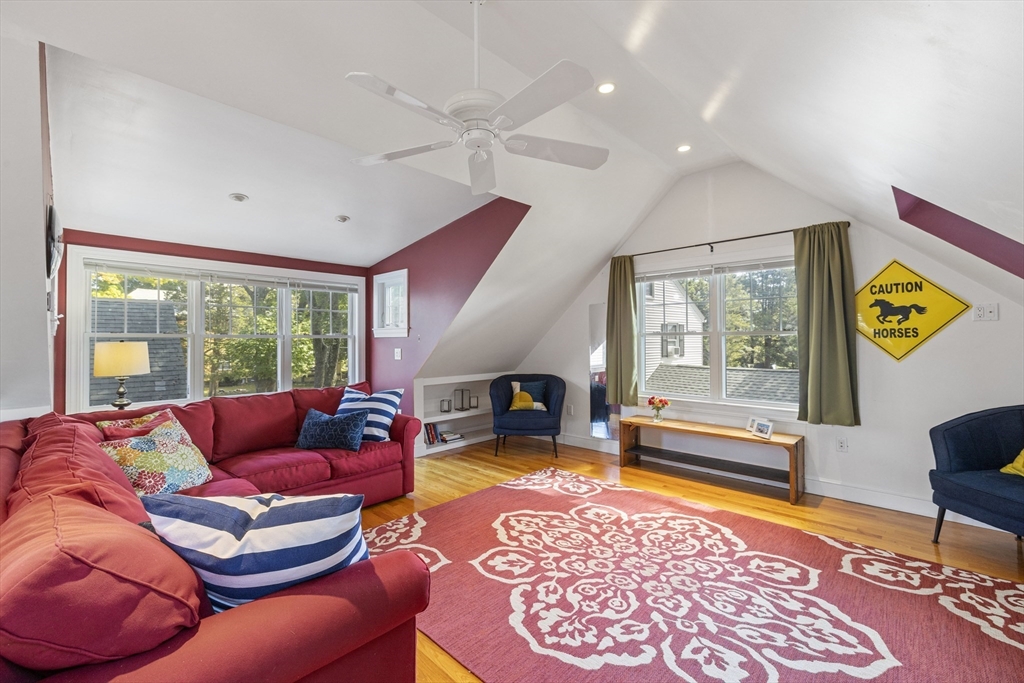 8 Hatch Road Medford, MA 02155 - Photo 6 of 42 a living room with furniture a rug and a flat screen tv