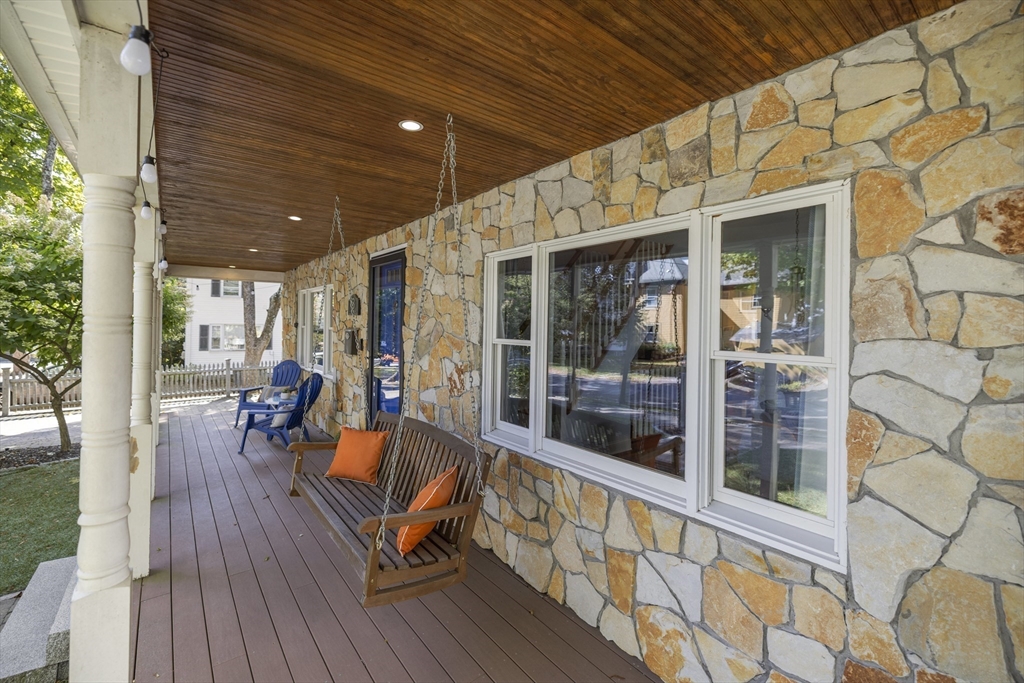 8 Hatch Road Medford, MA 02155 - Photo 8 of 42 a view of a chairs and table in the balcony