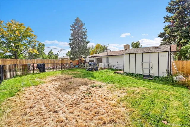 a view of a backyard with a garden