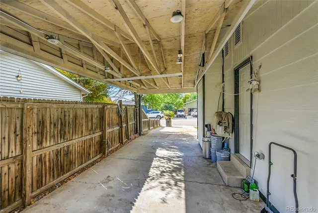 a view of a pathway with a porch