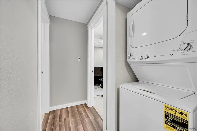 a view of storage and utility room with washer and dryer