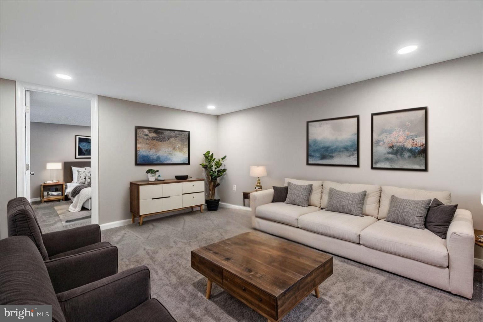 25 Mansion Road Linthicum Heights, MD 21090 - Photo 20 of 26 a living room with furniture and a flat screen tv