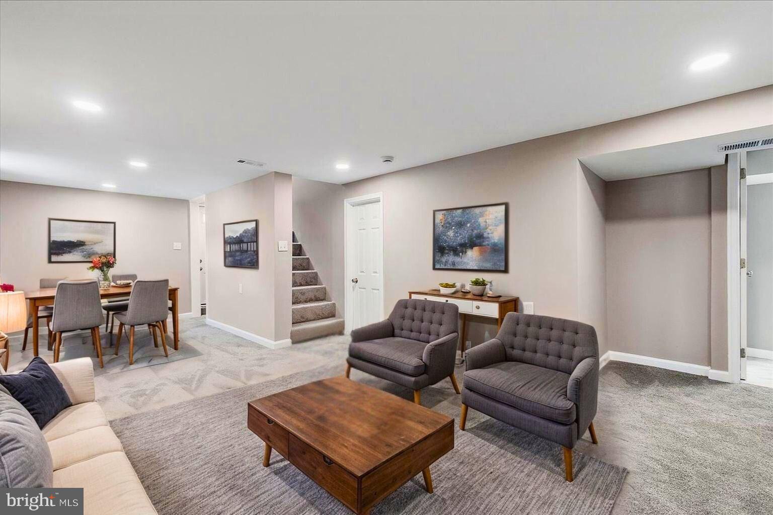 25 Mansion Road Linthicum Heights, MD 21090 - Photo 21 of 26 a living room with furniture and wooden floor