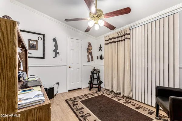 a bathroom with a sink a toilet a mirror and shower