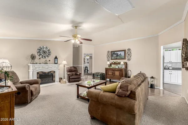 a kitchen with stainless steel appliances granite countertop a stove top oven a sink a counter space and cabinets