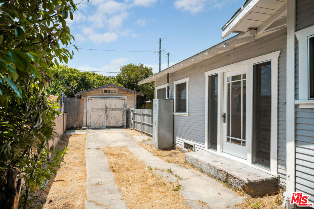 2346 Ridgeview Avenue Los Angeles, CA 90041 - Photo 14 of 22 a yellow house with a outdoor space