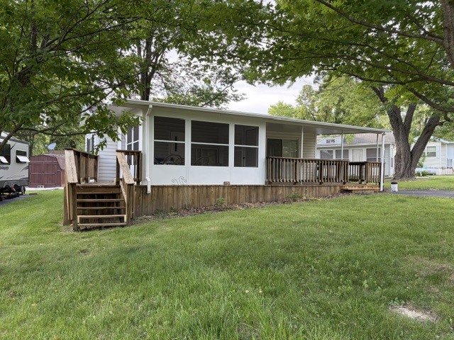 2795 East 28th Road Marseilles, IL 61341 - Photo 4 of 57 a view of a house with a yard and sitting area