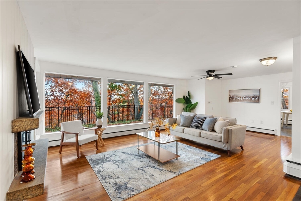 2 McIntyre Road Saugus, MA 01906 - Photo 13 of 42 a living room with furniture and a large window