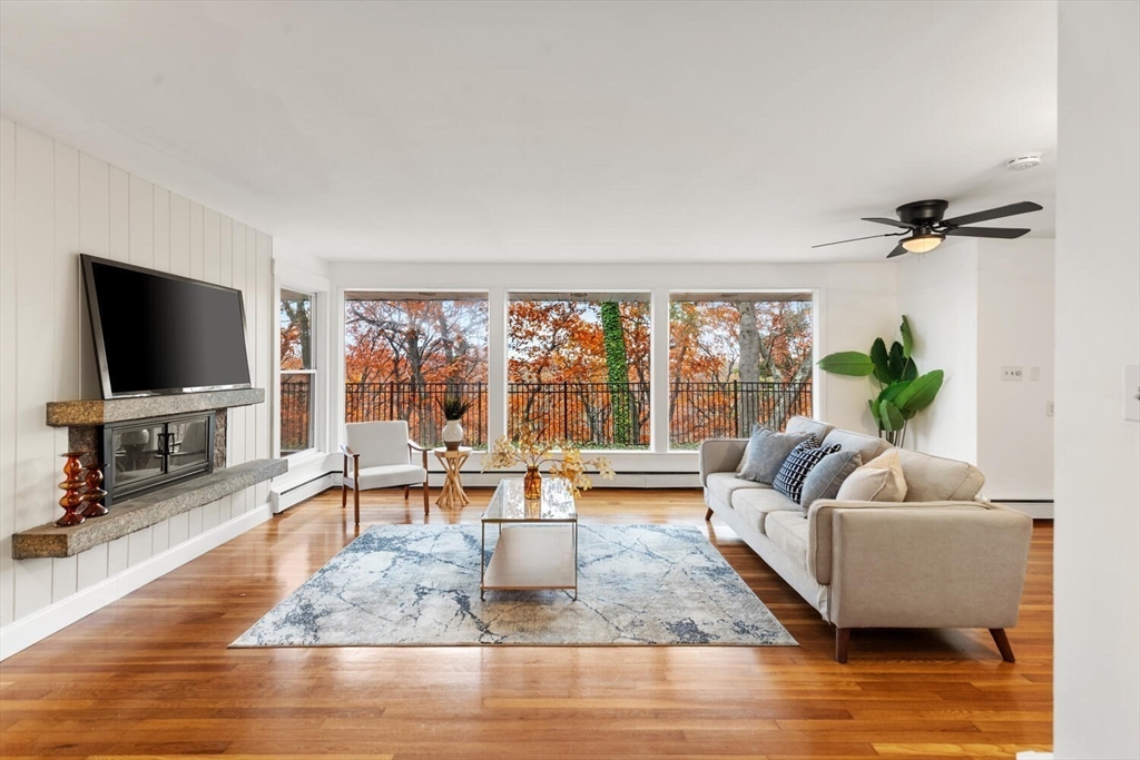 2 McIntyre Road Saugus, MA 01906 - Photo 14 of 42 a living room with furniture and a flat screen tv