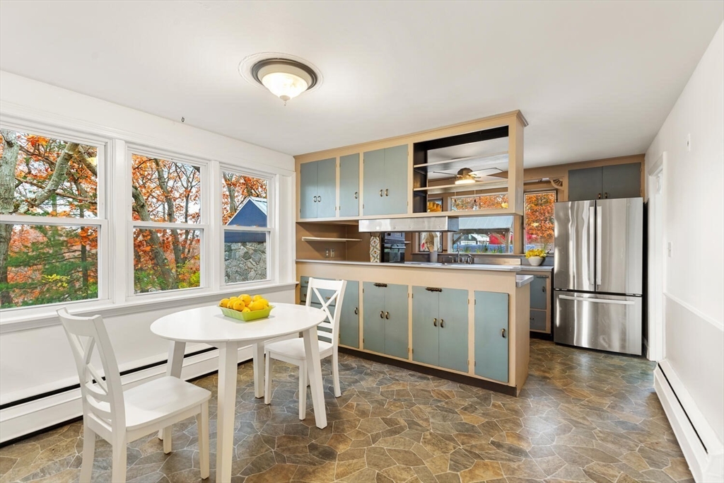 2 McIntyre Road Saugus, MA 01906 - Photo 18 of 42 a kitchen with a refrigerator and a stove