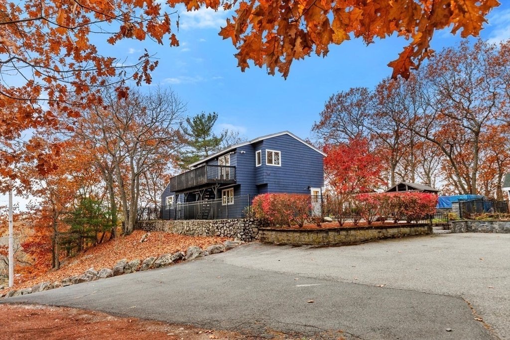 2 McIntyre Road Saugus, MA 01906 - Photo 40 of 42 a front view of a house with a yard