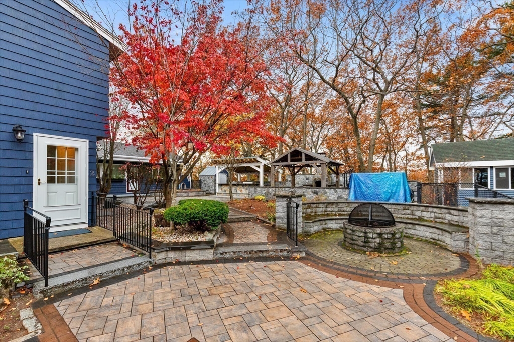 2 McIntyre Road Saugus, MA 01906 - Photo 6 of 42 a view of a house with backyard porch and sitting area