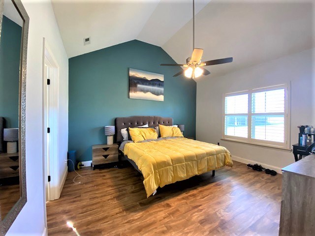 266 Owens Road Fort Mitchell, AL 36856 - Photo 7 of 16 a bedroom with a bed and a window