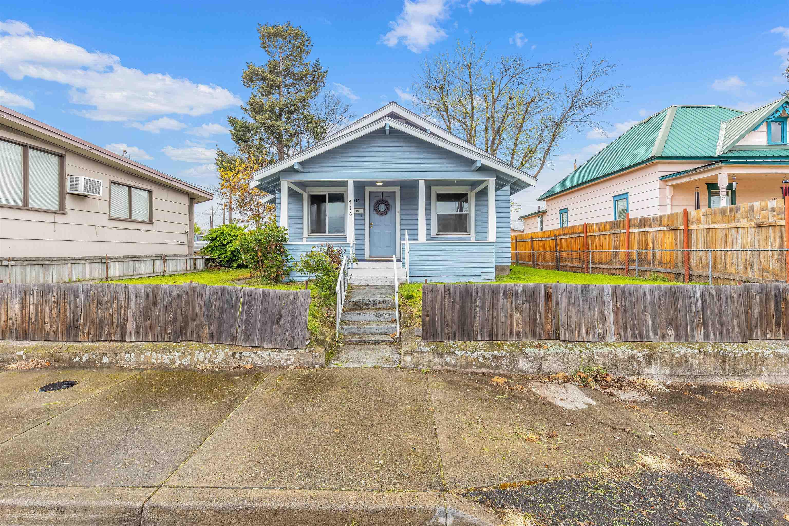View of front of property featuring a porch