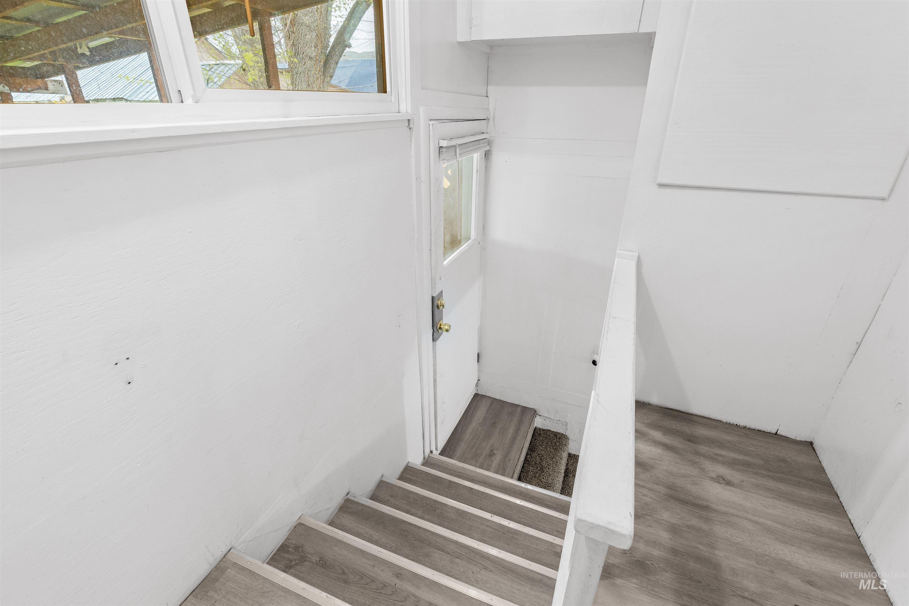 716 7th Street Clarkston, WA 99403 - Photo 24 of 38 Stairs featuring wood finished floors