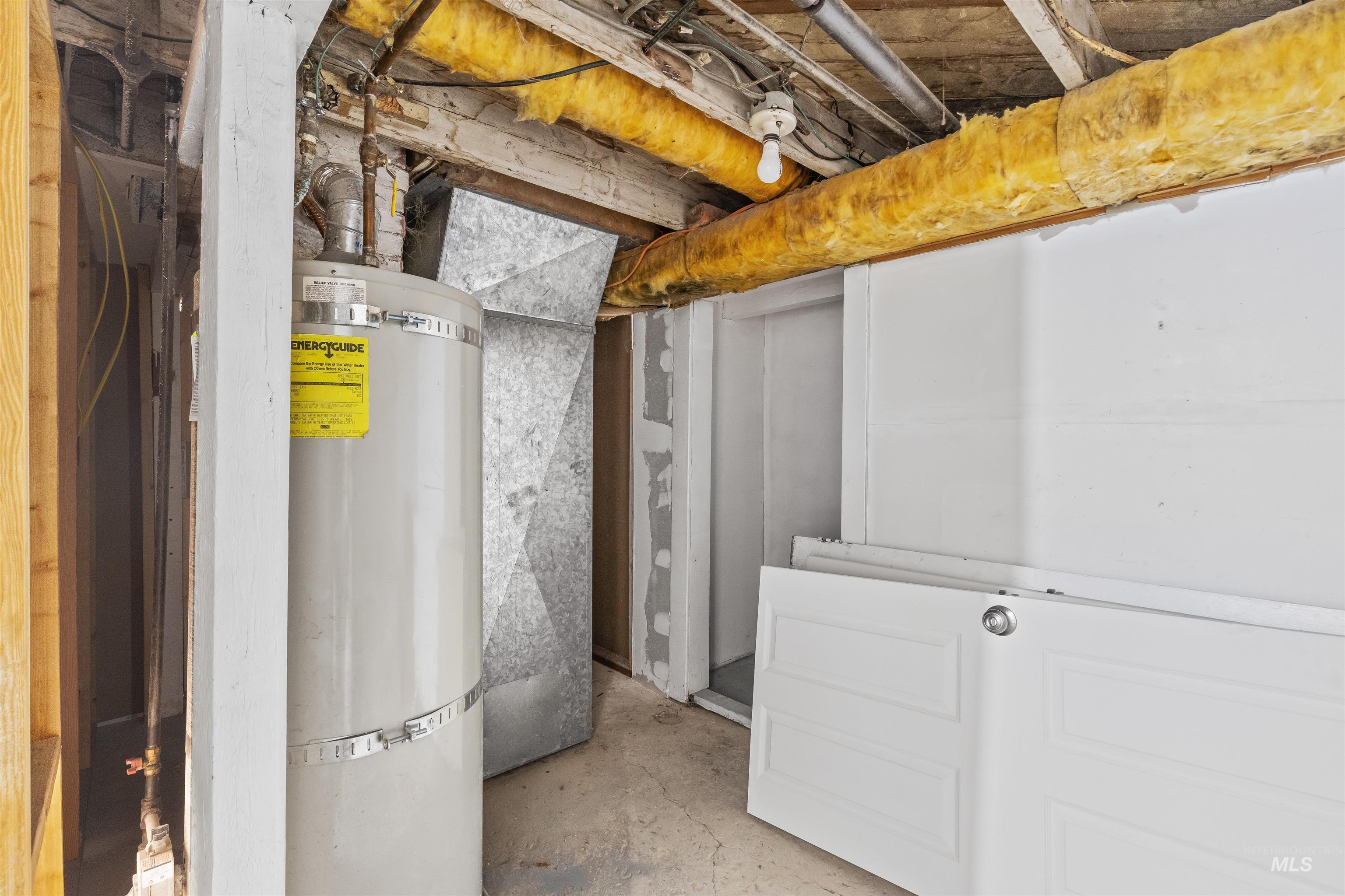 716 7th Street Clarkston, WA 99403 - Photo 27 of 38 Unfinished basement featuring strapped water heater