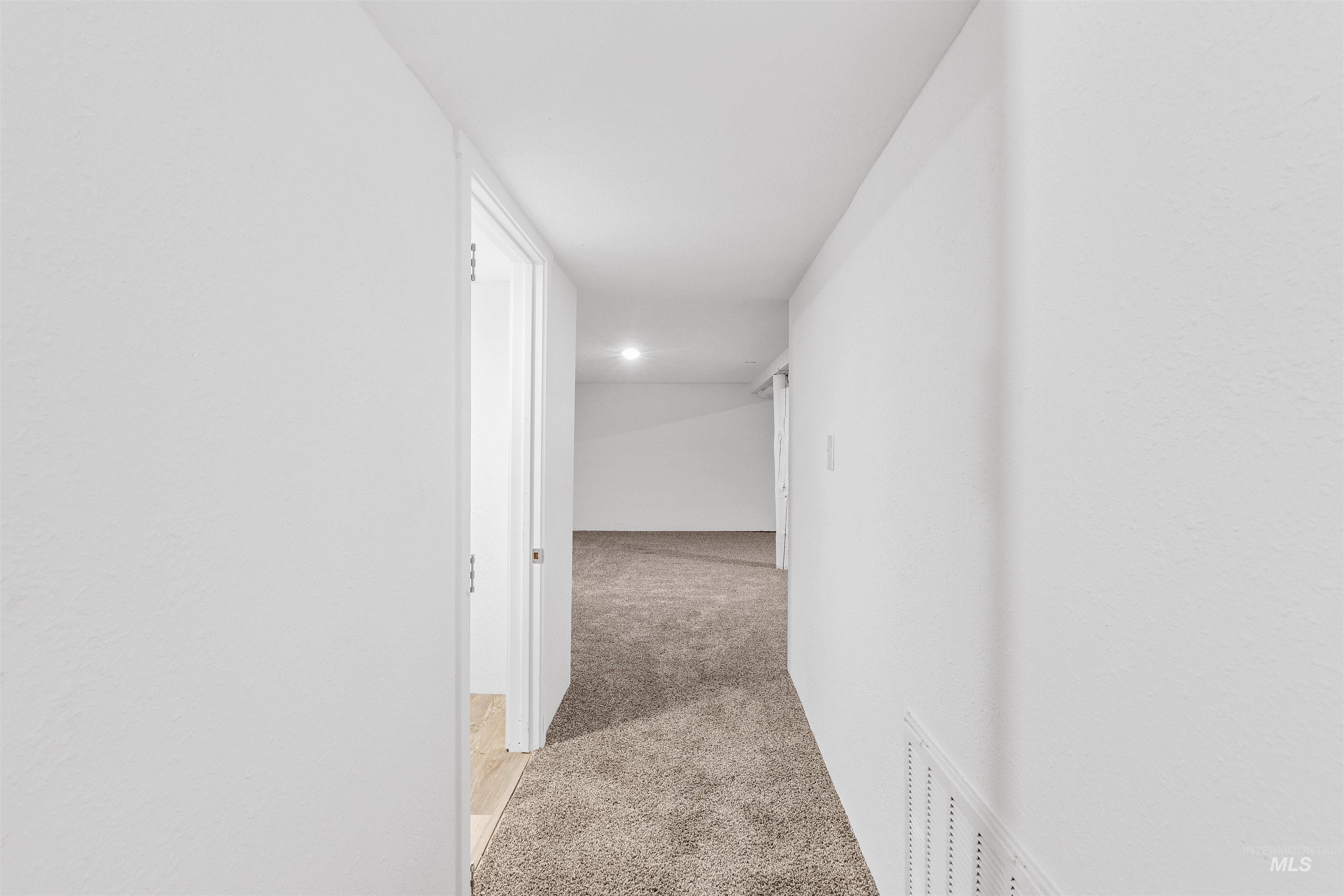 716 7th Street Clarkston, WA 99403 - Photo 28 of 38 Corridor with light colored carpet