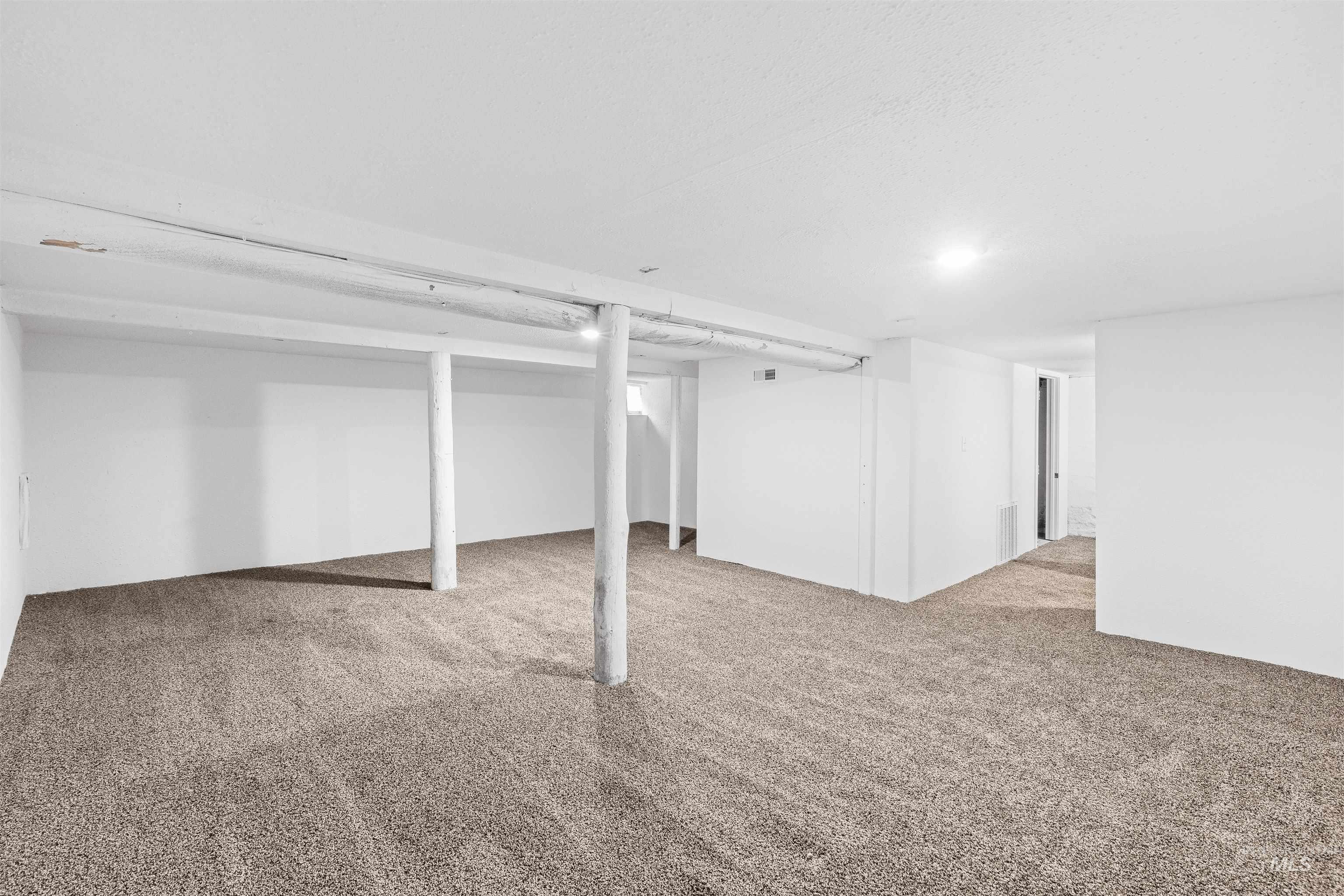 716 7th Street Clarkston, WA 99403 - Photo 30 of 38 Finished basement featuring light colored carpet