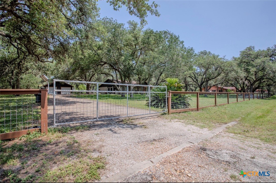 188 Cavalry Road Victoria, TX 77905 - Photo 29 of 30 a view of a yard with wooden fence