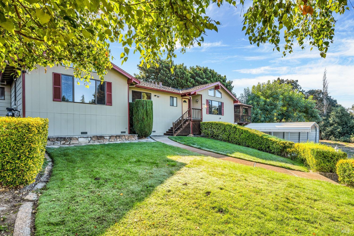 8593 Mill Station Road Sebastopol, CA 95472 - Photo 1 of 1 a view of house with backyard outdoor seating and hardwood