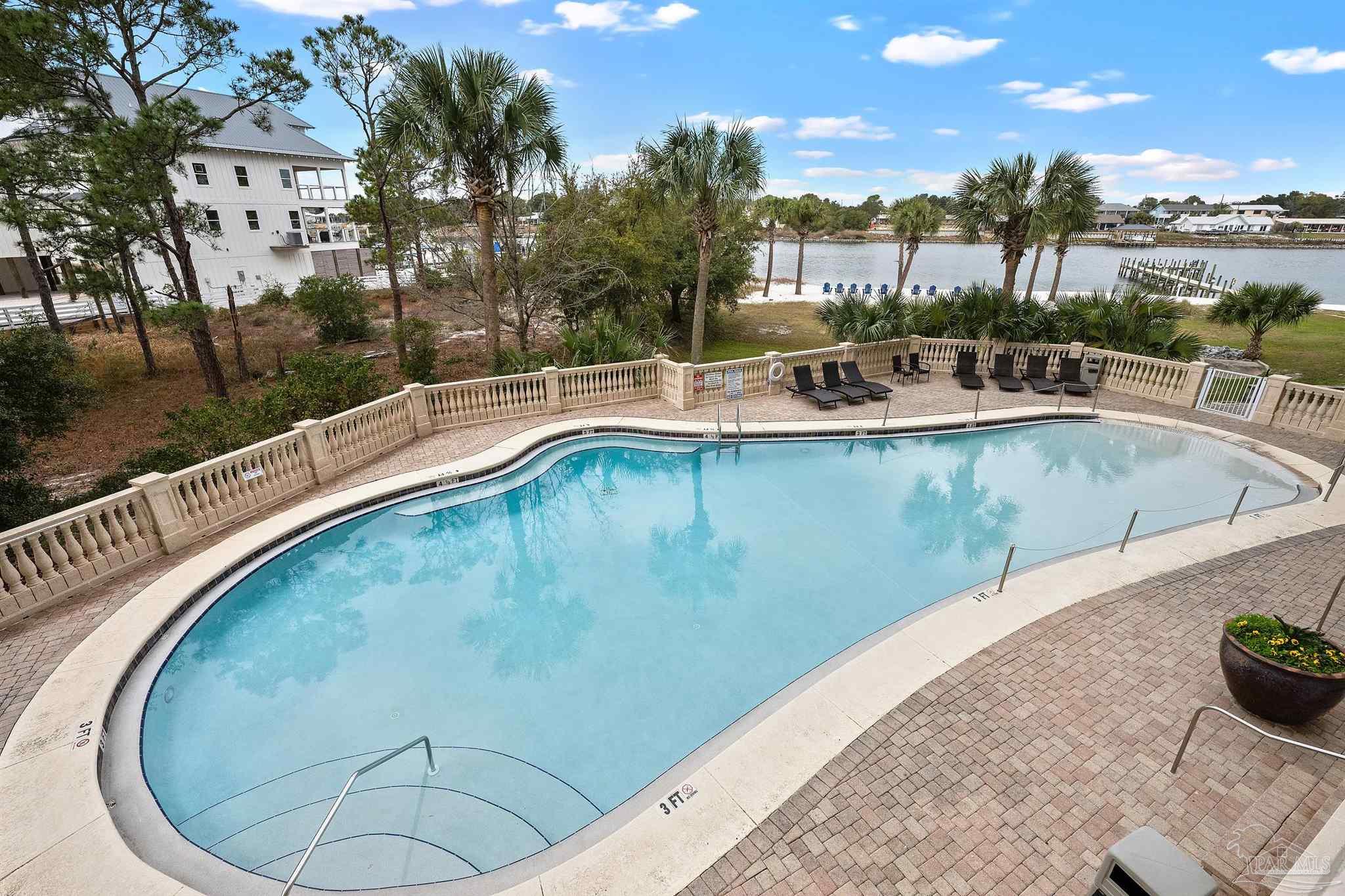 13928 River Road, Unit 204 Pensacola, FL 32507 - Photo 35 of 36 swimming pool view with a outdoor seating space