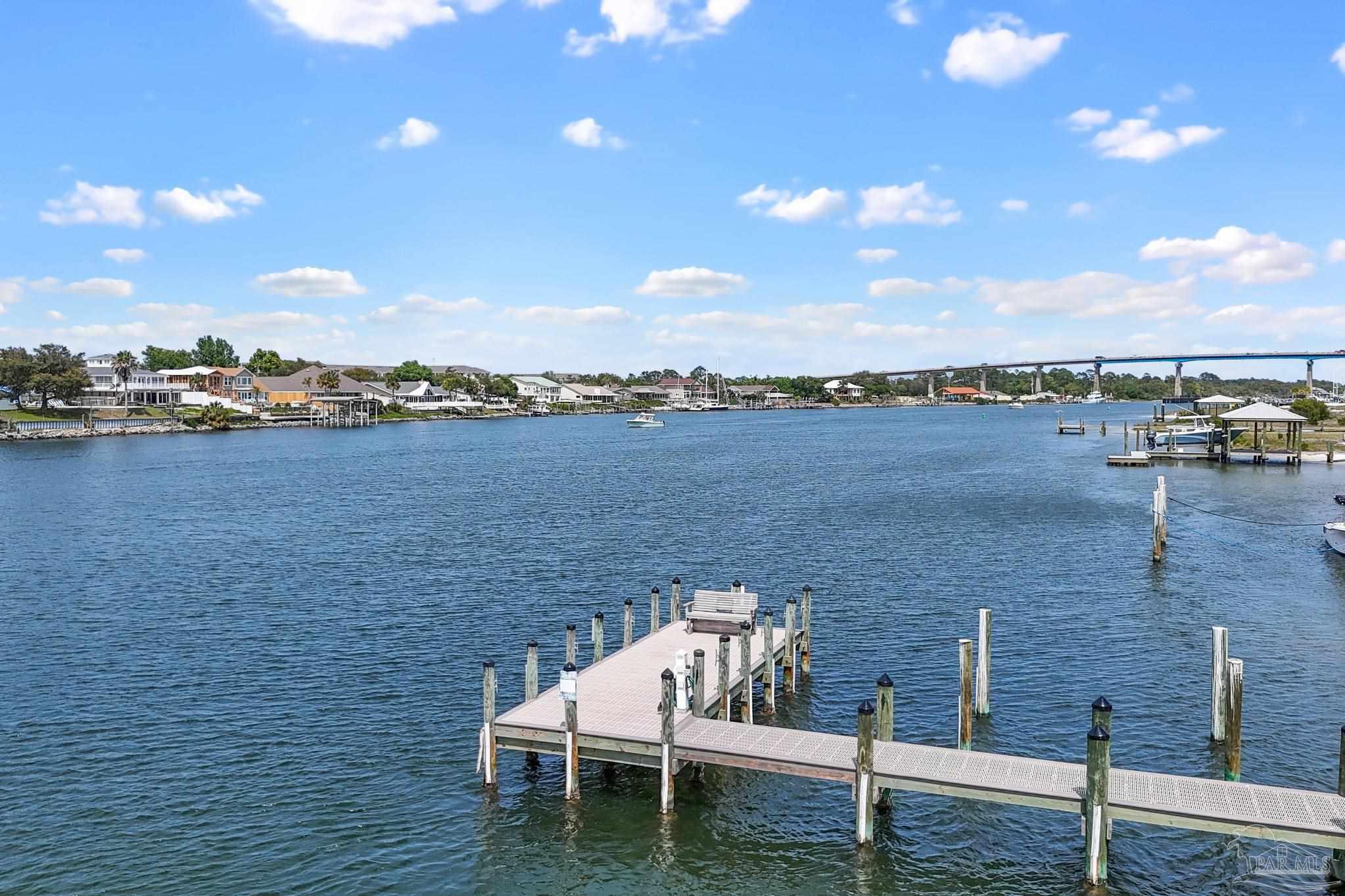 13928 River Road, Unit 204 Pensacola, FL 32507 - Photo 6 of 36 a terrace of a house with outdoor seating
