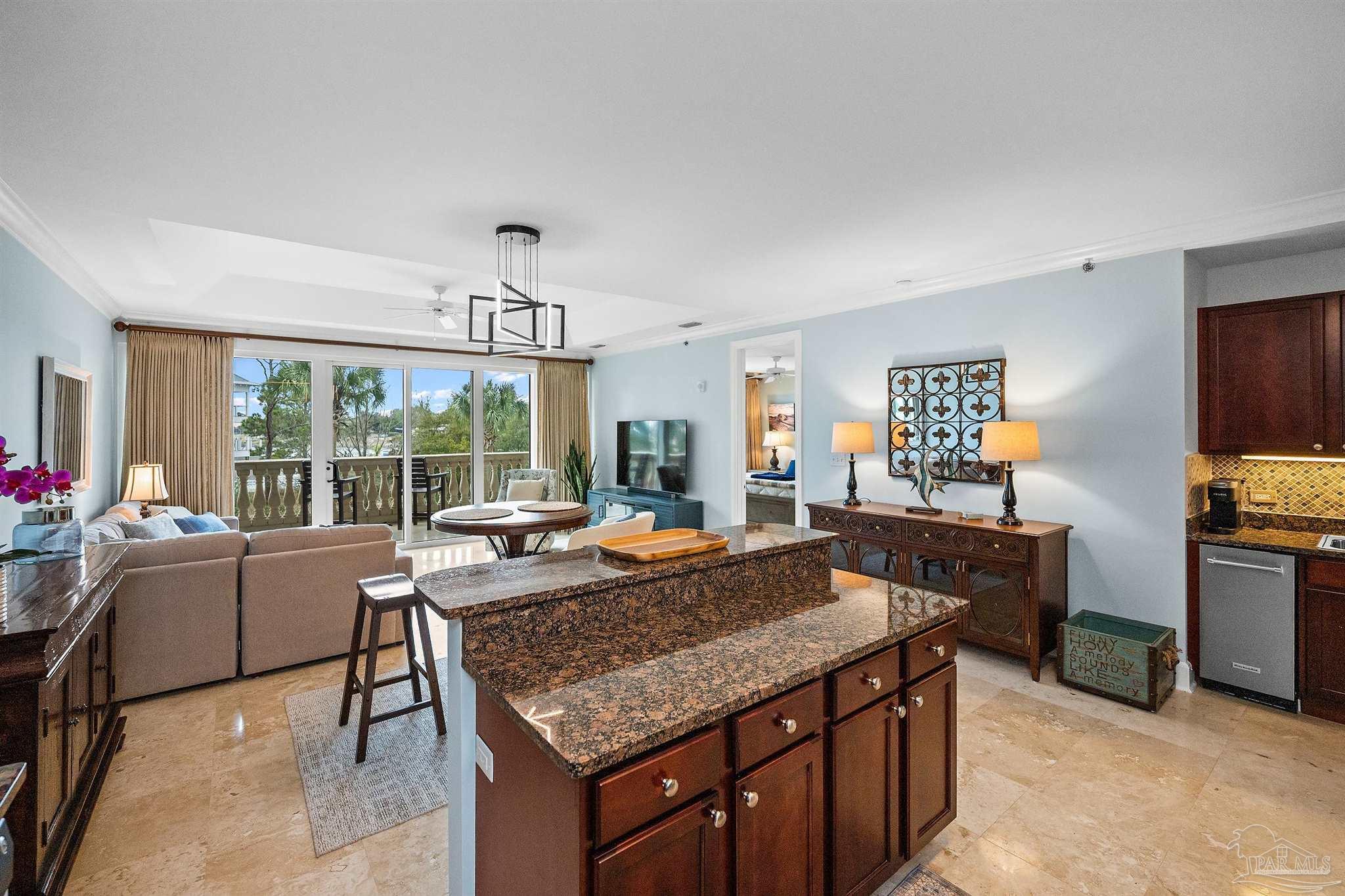 13928 River Road, Unit 204 Pensacola, FL 32507 - Photo 9 of 36 a view of a livingroom with furniture window and outside view