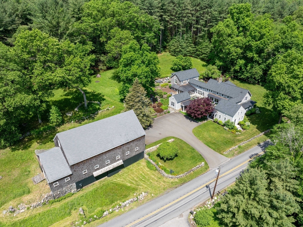 61 Dutton Road Sudbury, MA 01776 - Photo 1 of 42 an aerial view of house with yard