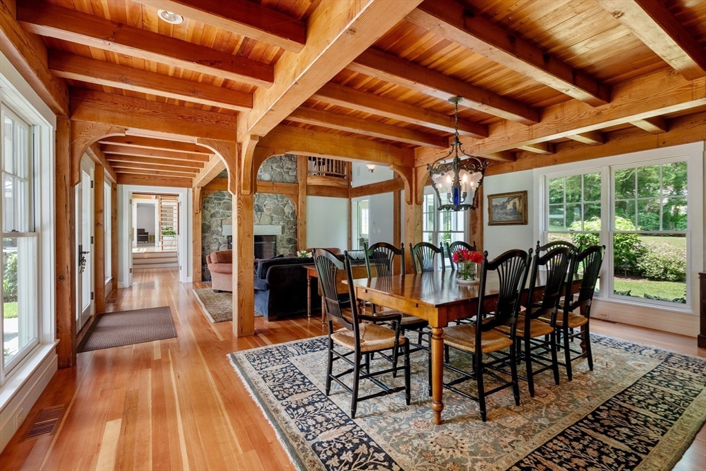 61 Dutton Road Sudbury, MA 01776 - Photo 15 of 42 a view of a dining room with furniture window and outside view