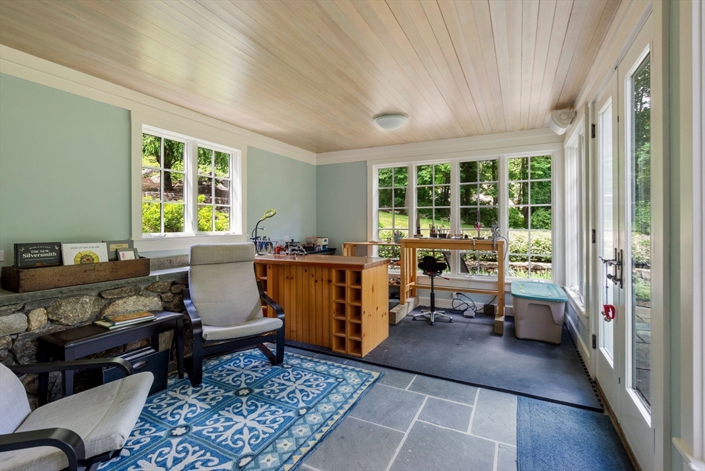 61 Dutton Road Sudbury, MA 01776 - Photo 20 of 42 a living room with furniture and large window