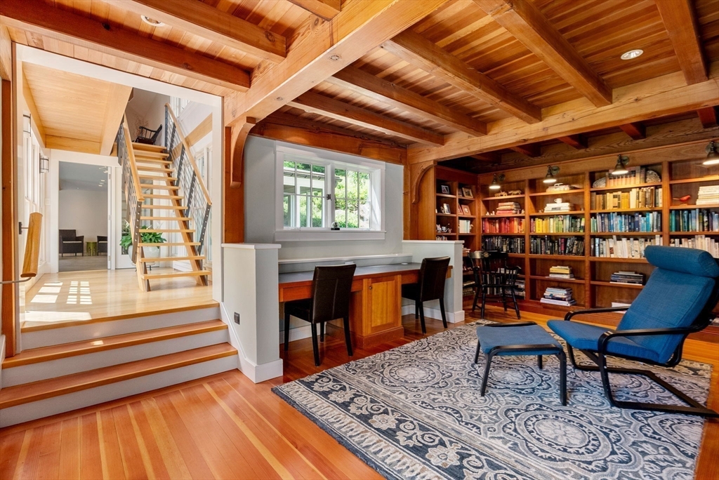 61 Dutton Road Sudbury, MA 01776 - Photo 21 of 42 a view of a room with lots of furniture and a rug