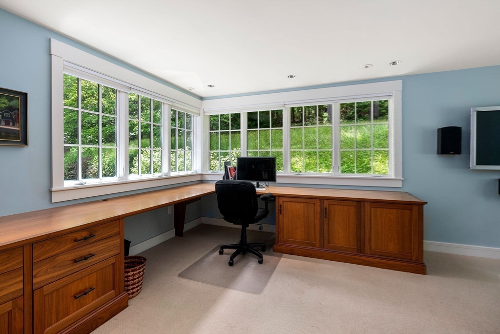 61 Dutton Road Sudbury, MA 01776 - Photo 31 of 42 a view of a workspace with furniture and a window
