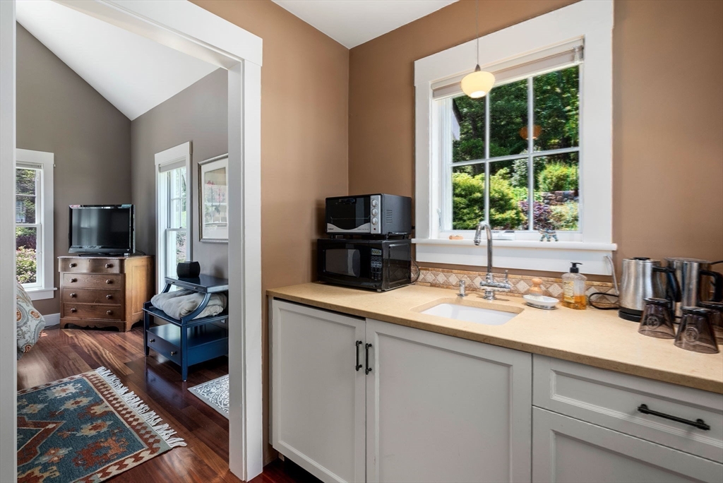 61 Dutton Road Sudbury, MA 01776 - Photo 40 of 42 a kitchen with a sink and a window